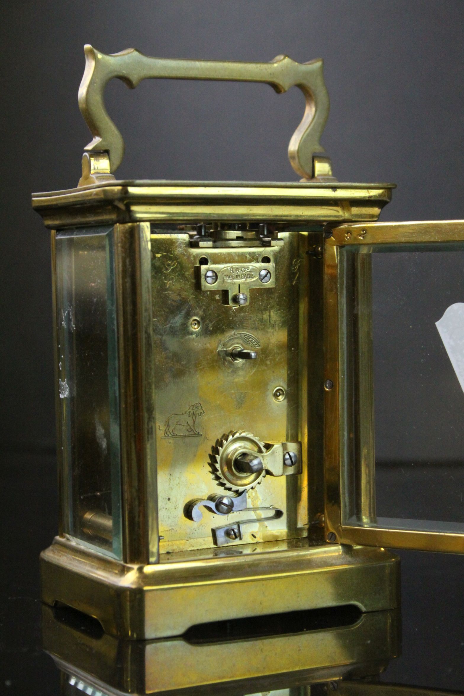 French Brass & bevelled Glass Carriage Clock with Enamel dial marked "R ...