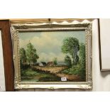 Swept framed oil painting of a pasture landscape with farmhouse, signed