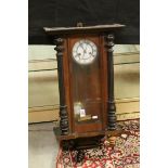 Antique wooden cased Vienna style wall clock with two train movement