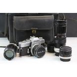 Cased Minolta SRT101 film Camera with accessories