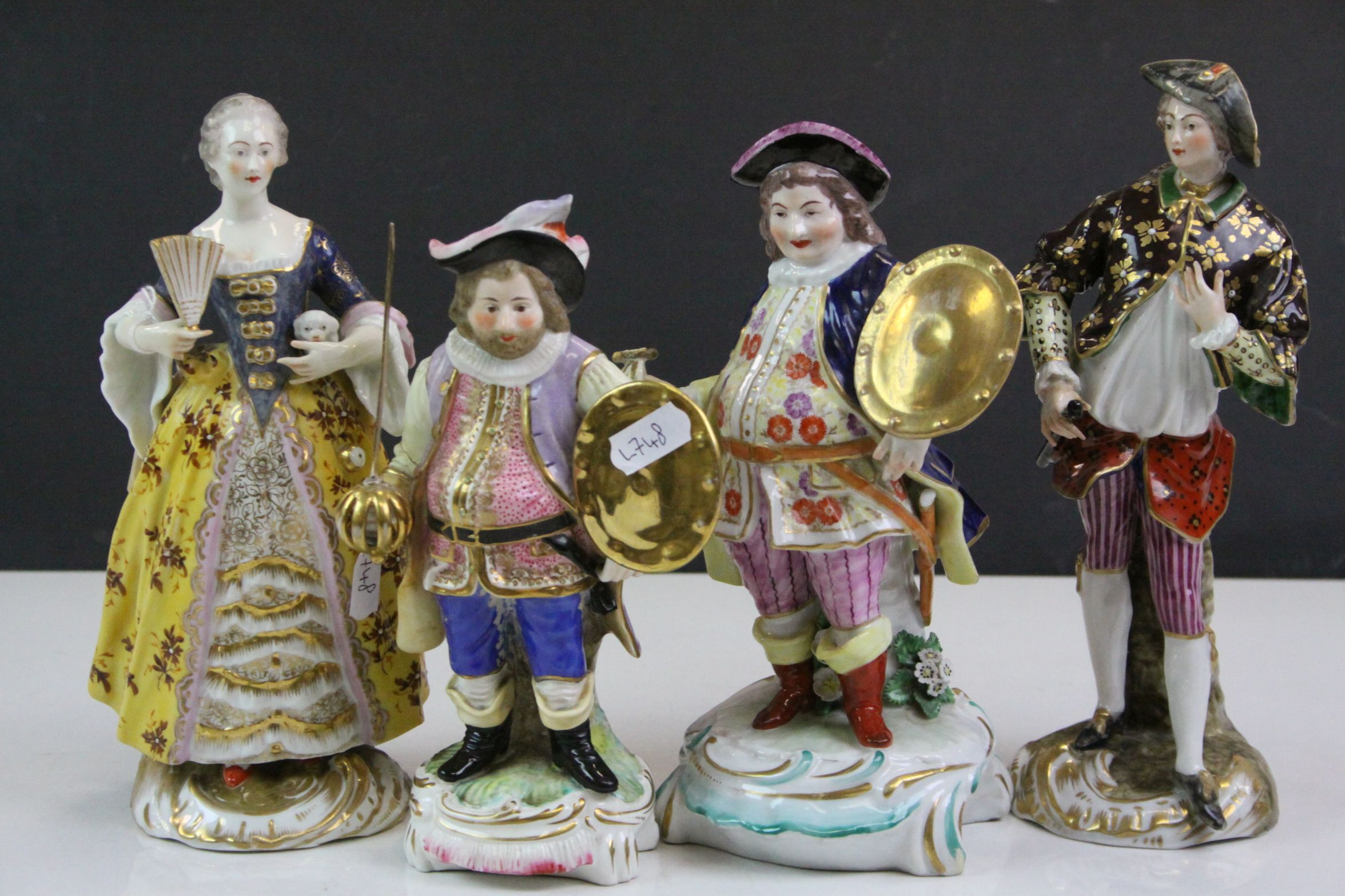 Three 19th Century Derby Porcelain figurines, one modelled as a figure with paunch carrying