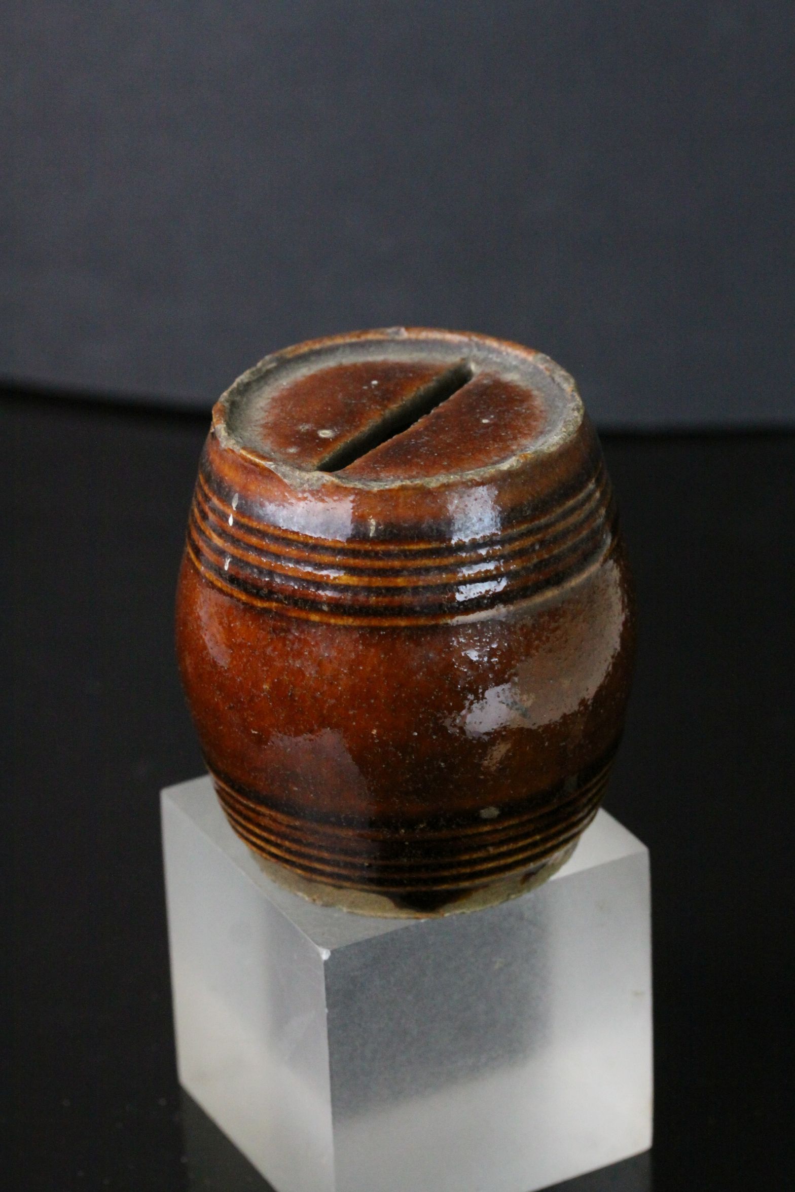 19th century treacle glaze money box in the form of a barrel