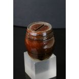 19th century treacle glaze money box in the form of a barrel