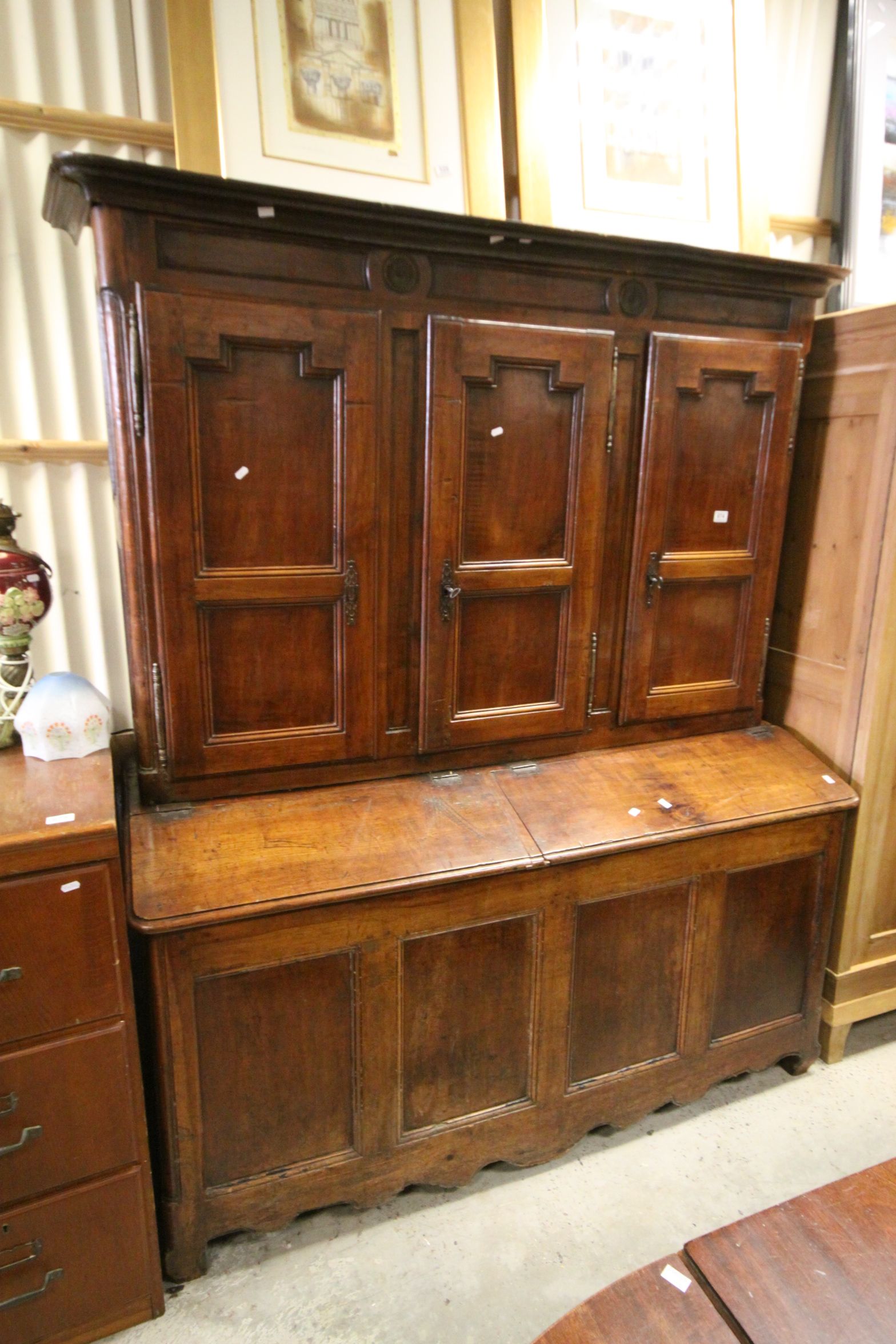 *18th century French Walnut Provincial Cupboard, the upper section with three cupboard doors above a