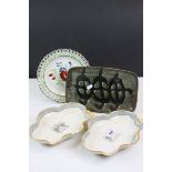 Two 19th century scalloped shaped dishes with lion crest, a floral decorated creamware plate, studio