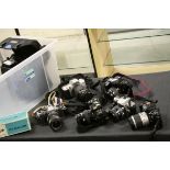 Large quantity of cameras and accessories, to include Canon, Cobra, Olympus, JVC etc (2 boxes)