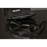 Pair of Gucci sunglasses, boxed