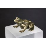 Small bronze/brass sculpture of a frog