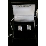 Pair of silver emerald cut CZ stud earrings