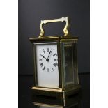 French Brass & bevelled Glass Carriage Clock with Enamel dial marked "R & Co Paris" & Lion makers