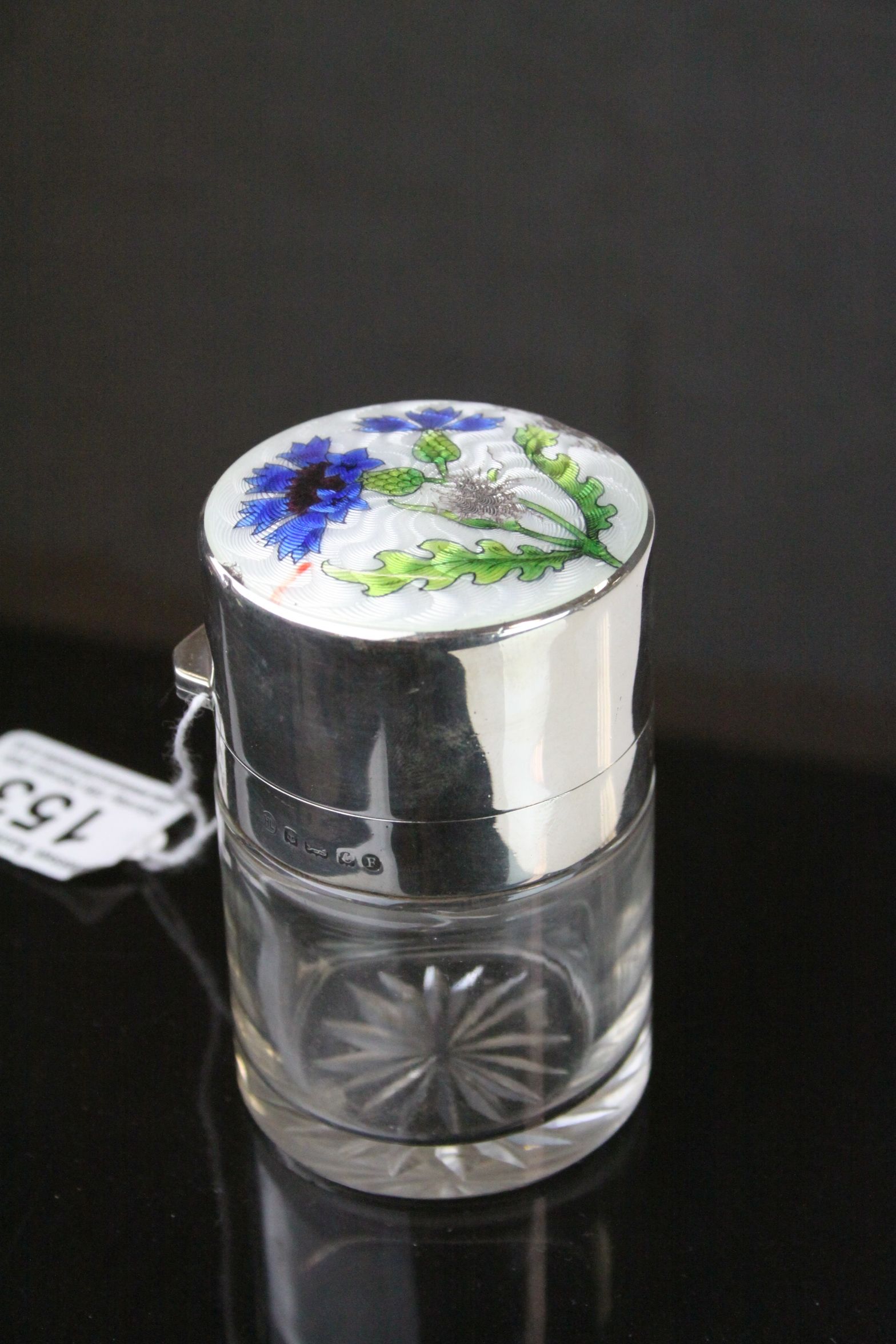 Hallmarked silver scent bottle with enamel thistle design to lid