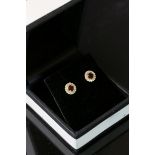 Pair of 18CT yellow gold ruby and diamond earrings of 60 points