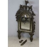 *18th century Italian Ebonised Wood Mirror, the carved and pierced frame shape as foliage, shaped
