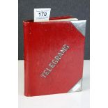 Red Leather bound "Telegrams" book, marked to front with Hallmarked Silver corners, dated 1899,