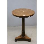 *19th century Mahogany Pedestal Table, the circular table top above a shaped frieze, on an enlarging