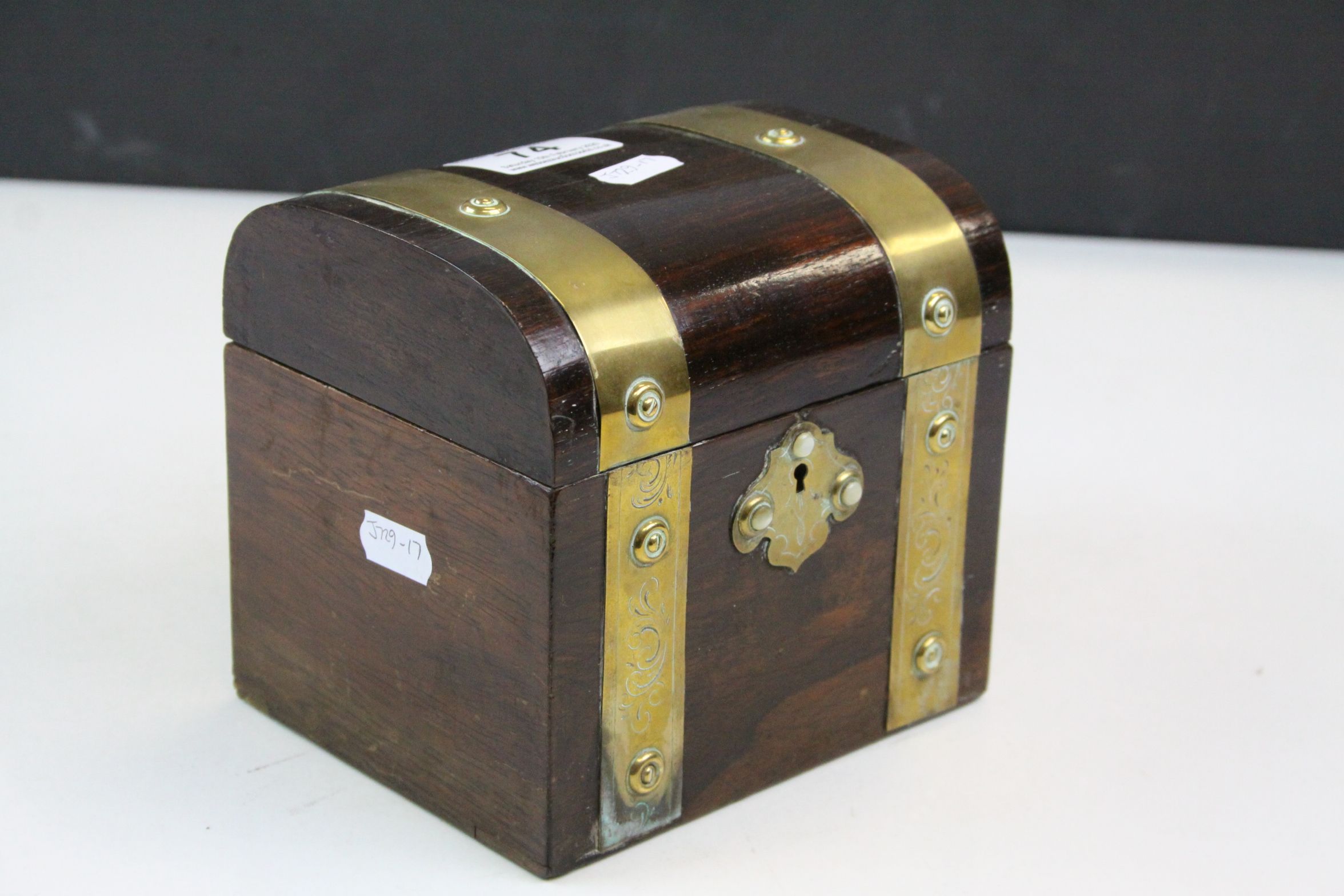 Brass banded single compartment tea caddy with cabouchon mother of pearl to the lock escutcheon