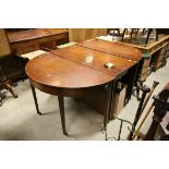 *George III Mahogany D-end Dining Table, circa 1780 - 1820, of rounded rectangular form with a