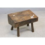 Oak Stool etched to the top ' G H 1662 ' and label to verso ' part of an Oak Beam taken from