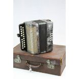 Leather Suitcase containing a vintage Hohner Accordion