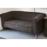 Victorian Chesterfield Sofa raised on turned legs with replacement castors, 173cms long x 82cms deep