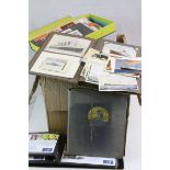 Box of albums containing unused stamps, FDCs, world stamps, postcards to include photographic