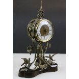Gilt metal key wind Striking Mantle Clock with Pheasant & Foliage design on wooden base, stands