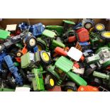 Large collection of loose, playworn, diecast tractors and agricultural implements, to include