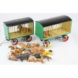 Two scratch built travelling animal cages using Mamod wheels plus quantity of plastic animal figures