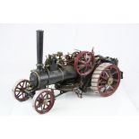 Large well built steam engine, metal, in black with maroon, approximately 2 foot in length,
