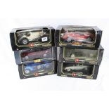 Six boxed 1:18 diecast model vehicles to include 5 x Burago 3005 Bugatti, 3038 Jaugar, 3007 Ferrari,