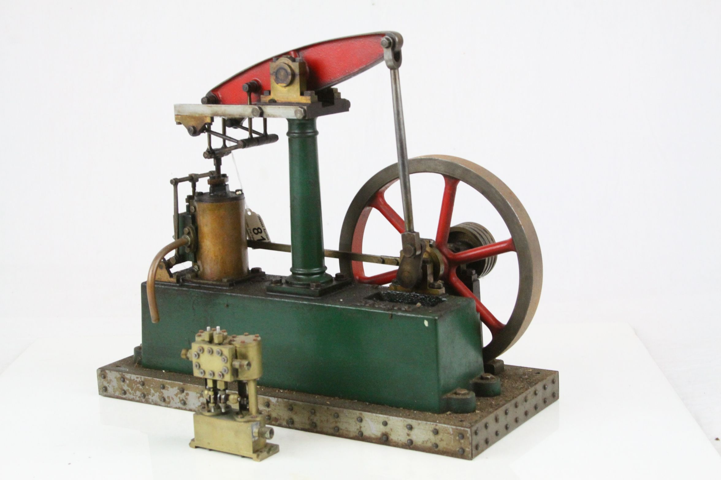 Stuart horizontal stationary beam engine with flywheel, cast iron, on cast base, base length 14"