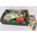 Quantity of vintage Lego bricks, minifigures, instructions, bases and accessories