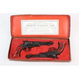 Boxed Crescent Matching Pair Texan Pistols black & red finish