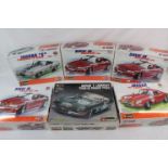 Six boxed & sealed Burago 1:18 metal model kits to include 7016 Jaguar Tour de France, 7049 BMW M