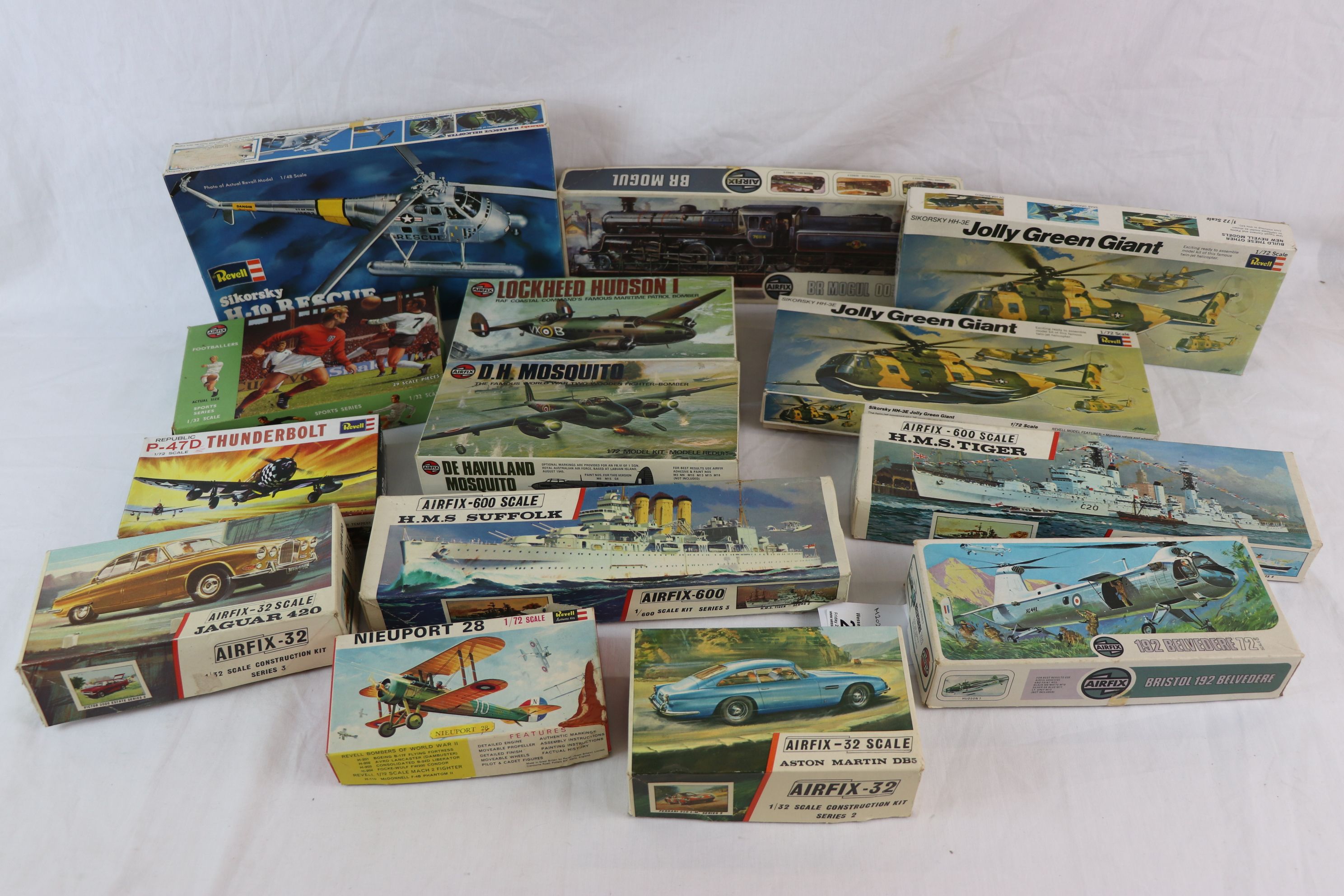 Collection of 13 boxed plastic model kits, various scales, to include Airfix Jaguar 420, BR Mogul,