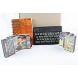 Sinclair ZX Spectrum with seven cassette games, power cable, instruction manual and documents