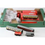 20 Hornby Dublo items of rolling stock to include 4 coaches in custom red boxes, wagons and other