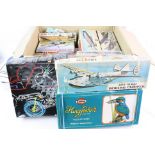 A collection of vintage plastic model kits to include a Boeing Clipper, Spitfire 1X, And A Super