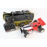 A Tamiya Baja Champ 1/10 scale electric radio control car on TL-01B chassis together with battery,