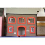 Wooden grey and red dolls house with front opening