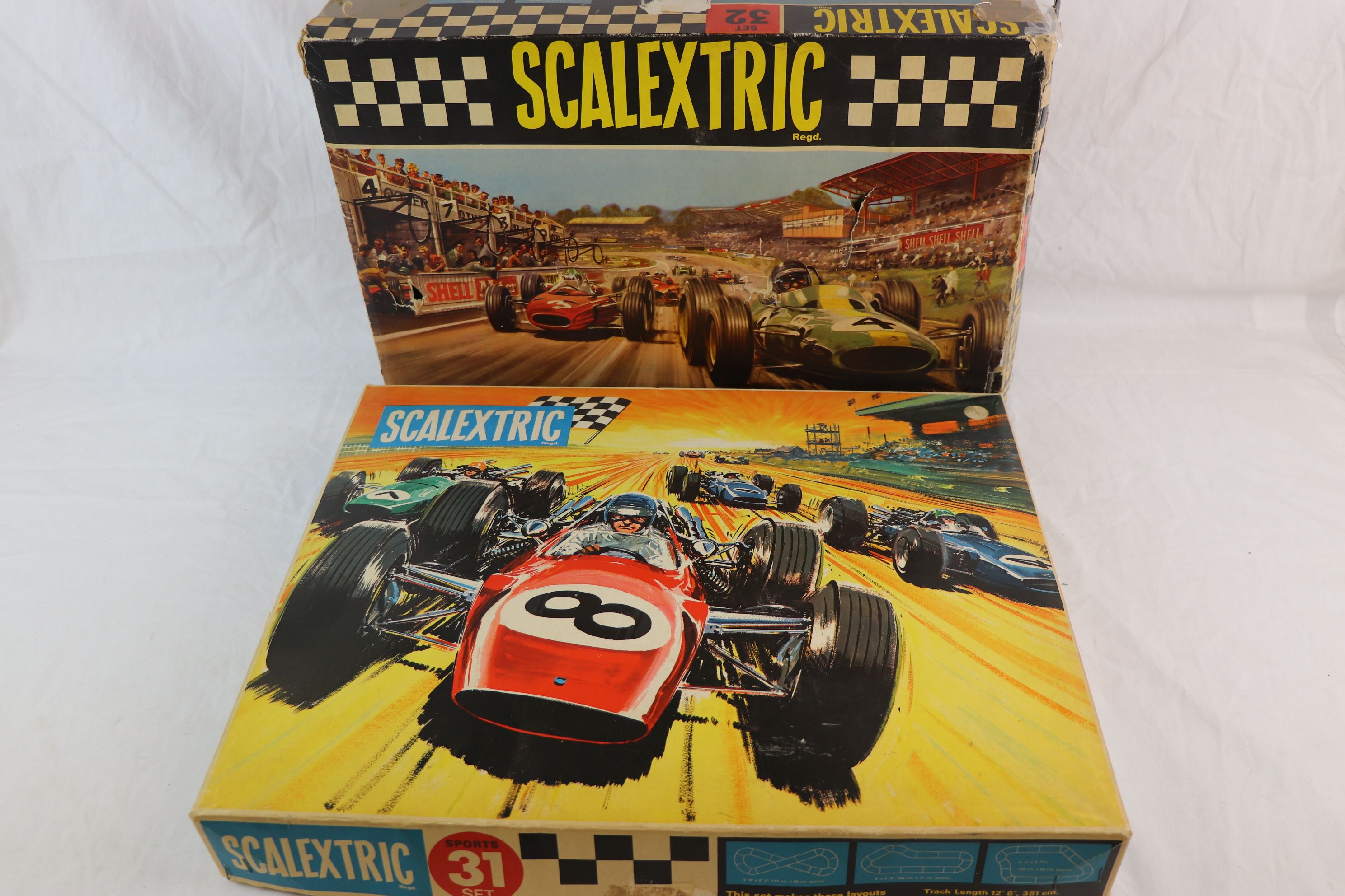 Scalextric - two vintage boxed sets, Sports Set 31 & Set 32, both appear complete, with slot cars