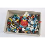 Collection of 14 Peyo Schleich Smurf figures to include Doctor Smurf, Tennis Smurf, Hang Glider,