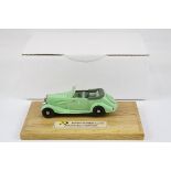 Boxed 1:43 Heco Models Miniatures Lyon Peugeot 601 Cabriolet metal model in pale green, on wooden