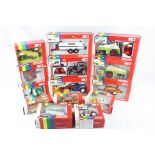 14 boxed Britains 1:32 scale diecast agricultural vehicles and implements, to include nos. 9538,