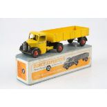 Boxed Dinky Supertoys No. 521 Bedford Articulated Lorry diecast model in yellow with red hubs, paint