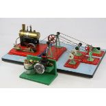 Six Mamod stationary engines on bases, connected to boiler plus additional gauge