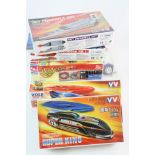 Six boxed and sealed plastic/metal model kits to include Burago 7093 1:18 VW Beetle 1998, AMT ERTL