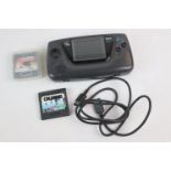 Sega Game Gear console with 2 x game cartridges to include Columbus and cased Road Rash