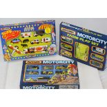 Three boxed diecast model play sets to include Circus Circus, Farm Play Set MC802 and Motorcity MC8,