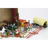 Group of plastic Cowboy & Indian figures, wagons and accessories to include Britains, Herald,